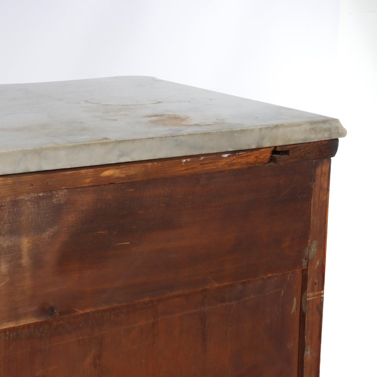 Antique Carved Flame Mahogany Serpentine 4-Drawer Marble Top Dresser