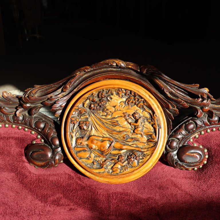 Antique Italian Baroque Figural Carved Walnut Curved Sofa with Women & Cherubs
