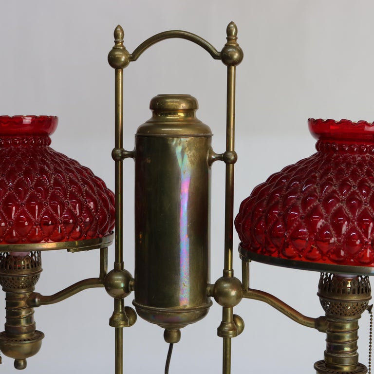 Antique Harvard Brass Double Student Lamp With Ribbed Red Shades