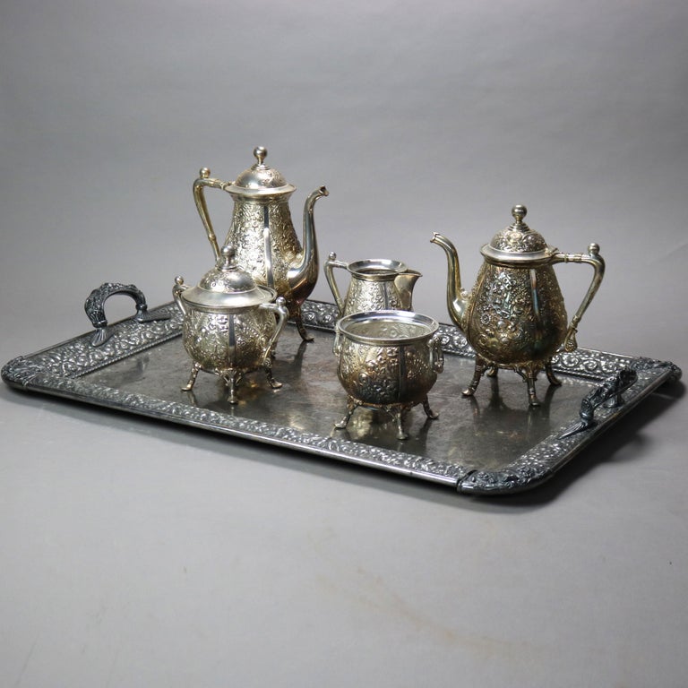 Six-Piece Antique Silver Plated Floral Repousse Tea Set C1890