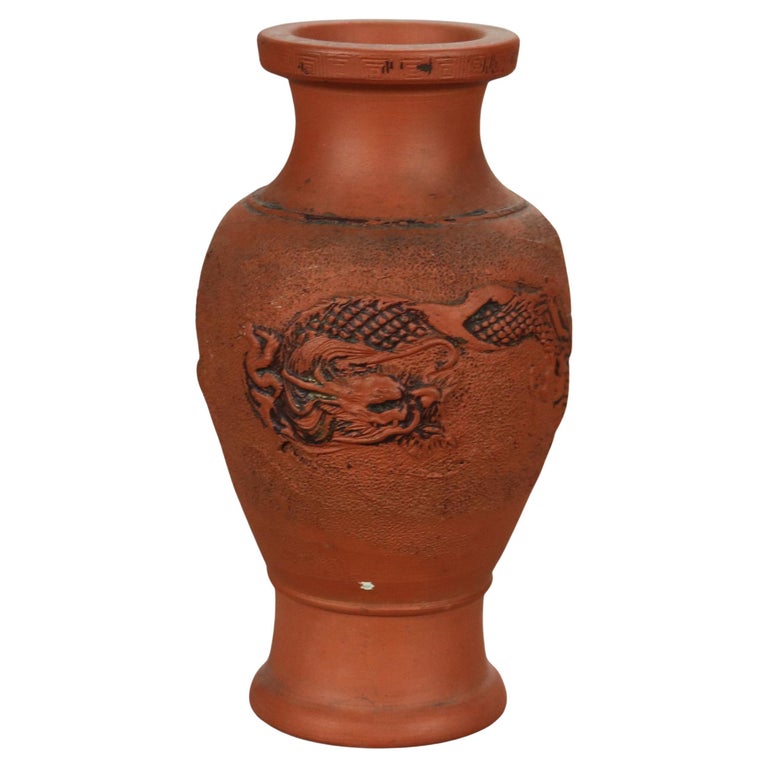 Nine Japanese Embossed Terra Cotta Vases C1930