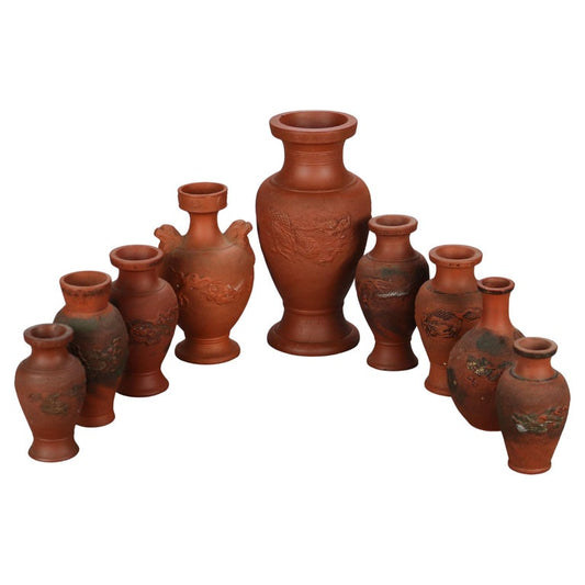 Nine Japanese Embossed Terra Cotta Vases C1930
